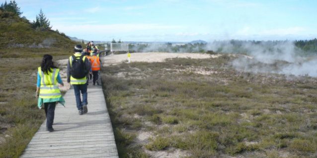 People walking on boardwalk